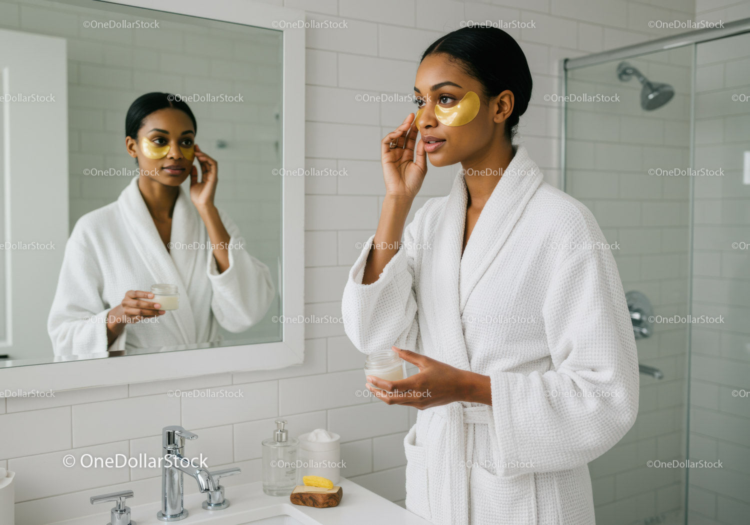 Young Woman Applying Eye Patches in Bathroom Mirror