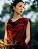 Elegant young woman in burgundy dress with floral accents