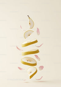 Floating Sliced Pear with Delicate Pink Petals