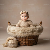 Adorable Baby Girl Sitting in Cozy Basket with Headband