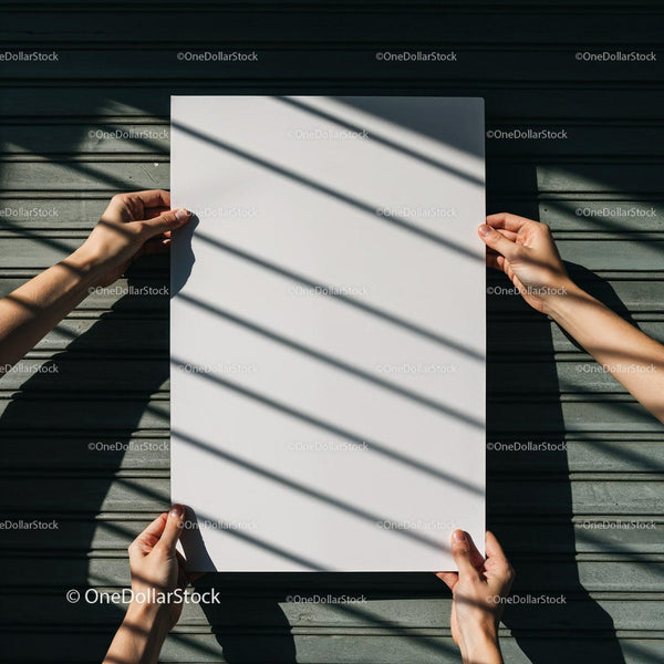 Hands holding blank white paper with shadows on metal background JPG Mockup Image