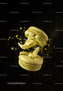 Green Macarons with Cream Filling Exploding on Black
