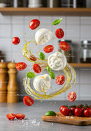 Fresh mozzarella with cherry tomatoes and basil splash