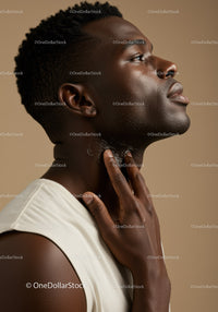 Portrait of a Man Applying Skincare Cream for Healthy Glowing Skin