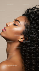 Profile of serene woman with natural curly hair