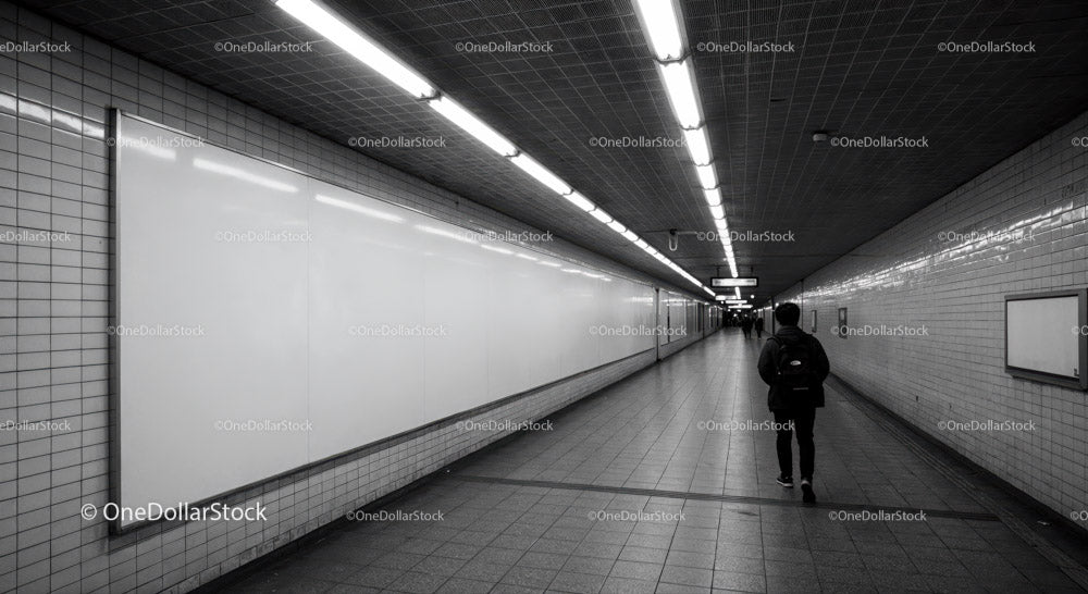 Minimalist Subway Tunnel with Tiled Walls and Modern Lighting