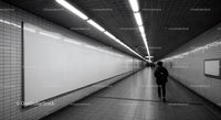 Minimalist Subway Tunnel with Tiled Walls and Modern Lighting