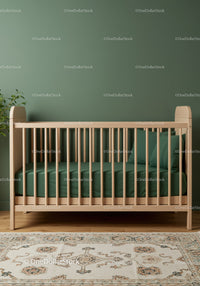 Modern Wooden Baby Crib with Green Bedding in Cozy Nursery