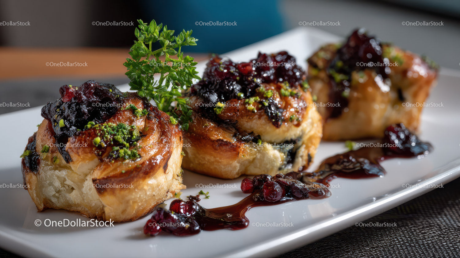 Delicious Blueberry Jam Filled Profiteroles on White Plate