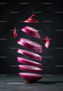 Floating Sliced Red Onion Against Dark Background