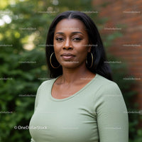 Confident woman outdoors with natural background