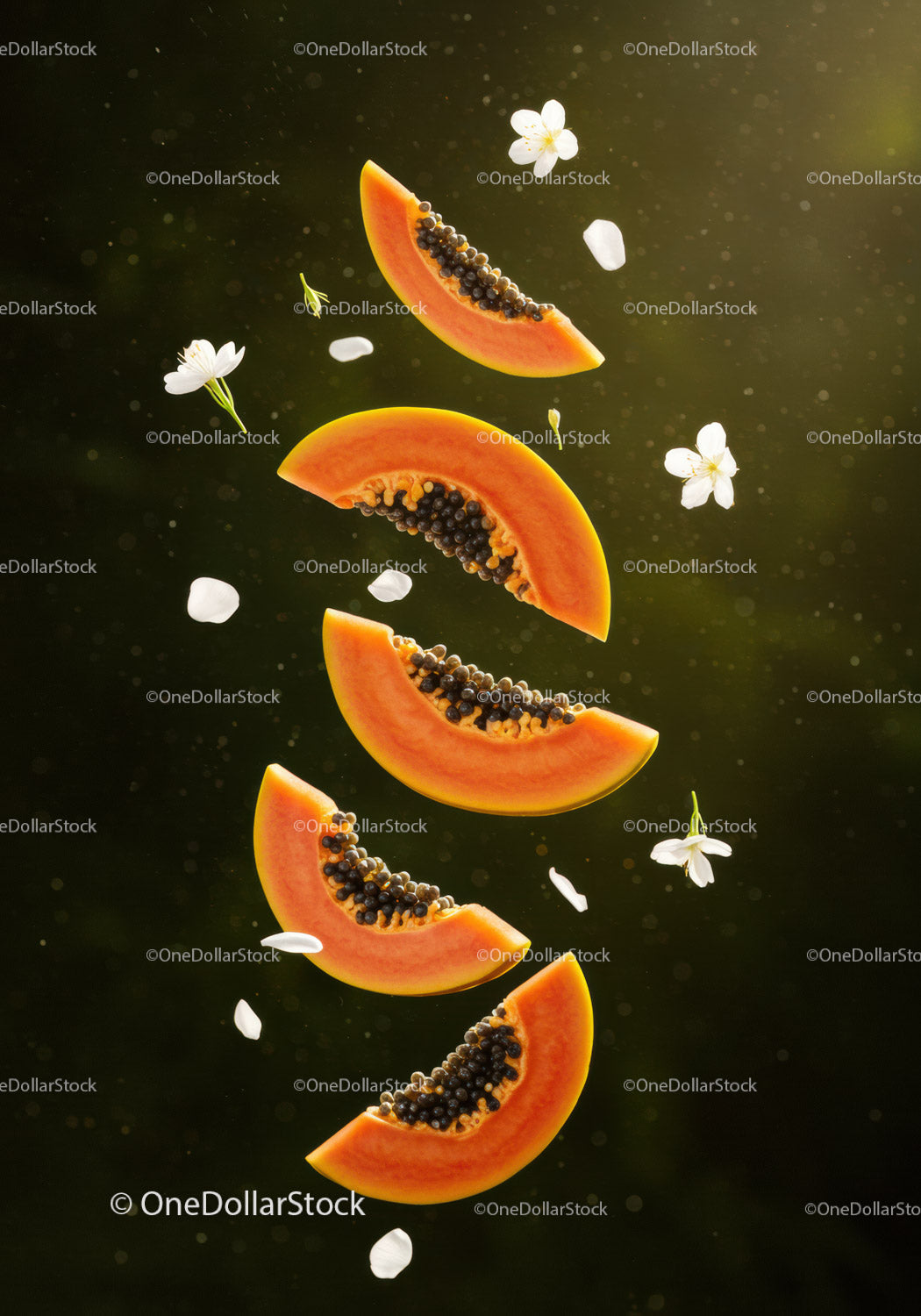 Fresh papaya slices with delicate white flowers floating