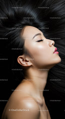 Profile of woman with sleek black hair and closed eyes