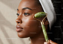 Close-Up of Black Woman Using Jade Roller for Facial Massage