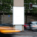 Blank city billboard at busy intersection with traffic