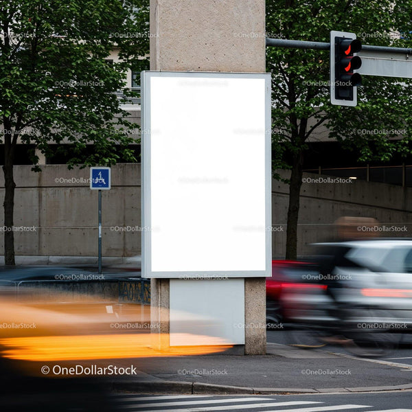 Blank city billboard at busy intersection with traffic JPG Mockup Image