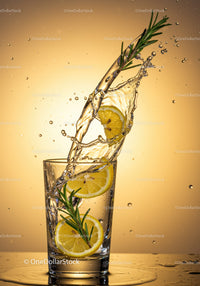 Refreshing lemon and rosemary splash in clear glass
