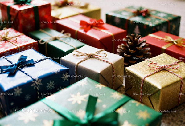 Colorful Wrapped Christmas Gifts with Pinecone Decoration