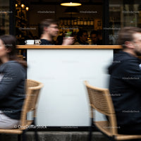 People Passing by Outdoor Café with Coffee Cups