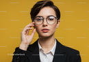 Professional Woman with Glasses Portrait on Yellow Background