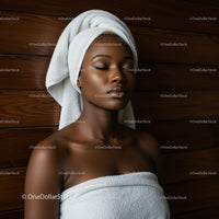 Serene Woman with Towel Wrap Relaxing in Spa Setting