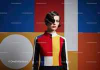 Fashion model in colorful geometric dress with retro hairstyle