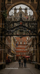 Historic European Street with Wrought Iron Decorations and Cobblestone Path