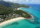 Beautiful Tropical Beach with Crystal Clear Water and Green Lush Surroundings