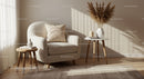 Cozy armchair with decorative pillow in sunlit corner