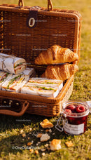 Fresh Picnic Basket with Sandwiches Croissants and Jam