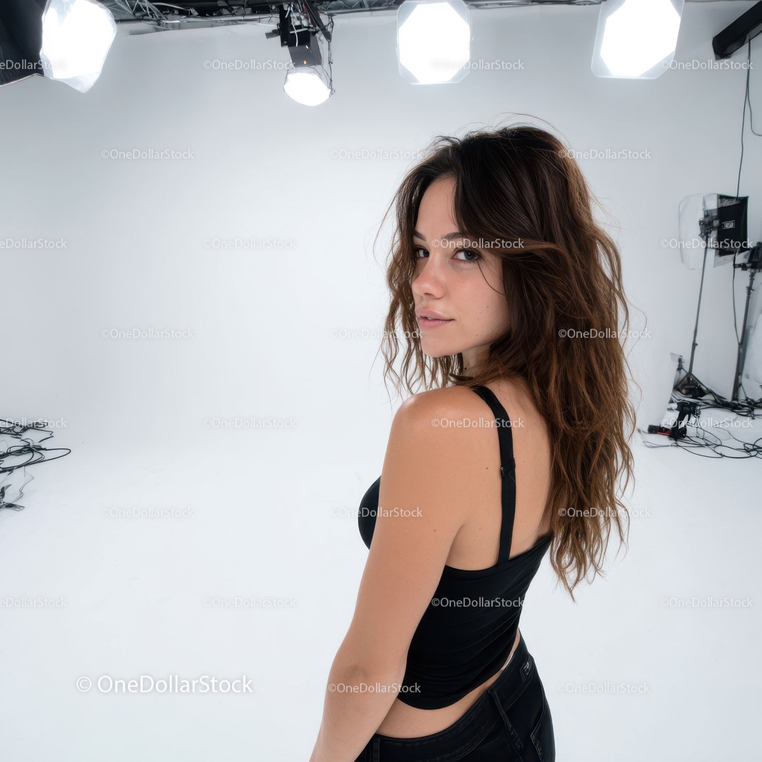 Portrait of a Young Woman with Wavy Hair in Studio