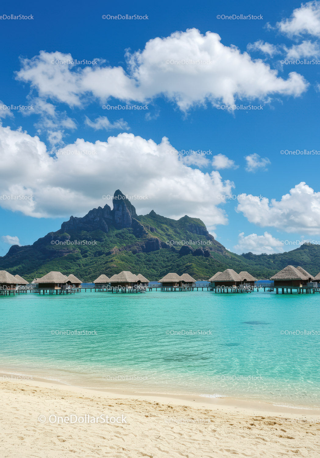 Tropical Island Overwater Bungalows with Mountain Backdrop