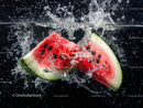 Juicy Watermelon Slices Splashing in Water on Black Background