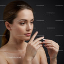 Portrait of a Woman Applying Skincare Product with Clear Skin