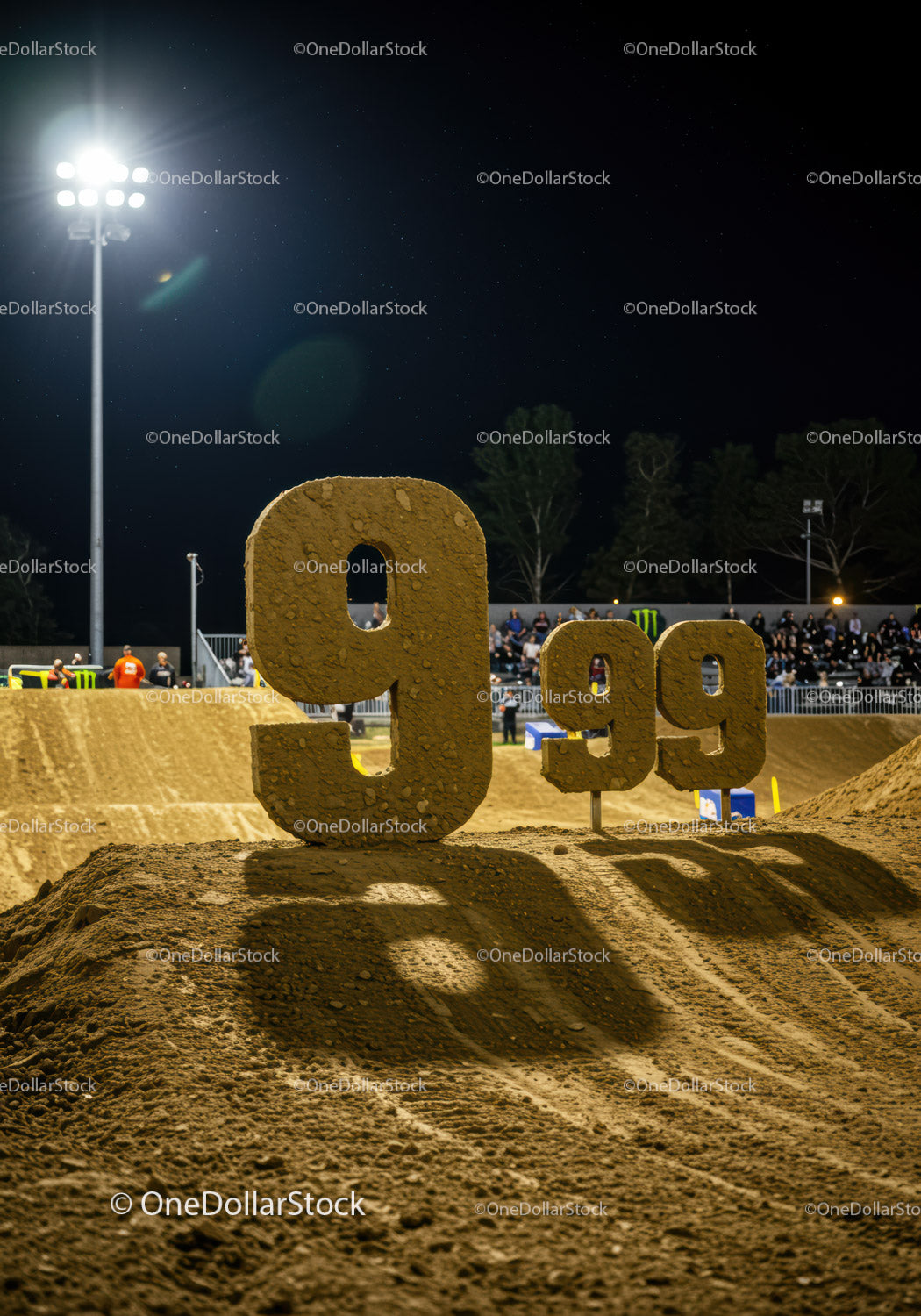 Nighttime motocross track with large dirt number markers