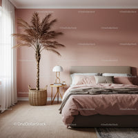 Modern Bedroom with Pink Walls and Cozy Bedding Featuring Indoor Plant
