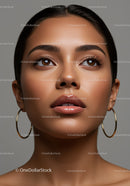Beauty Portrait of a Woman with Brown Eyes and Hoop Earrings