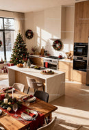 Festive Modern Kitchen and Dining Area with Christmas Decor