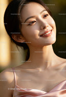 Smiling young woman enjoying warm sunlight outdoors