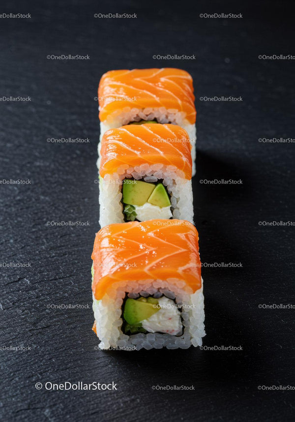 Fresh salmon sushi rolls with avocado and cream cheese