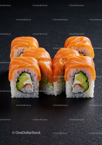Salmon sushi rolls with avocado and cream cheese