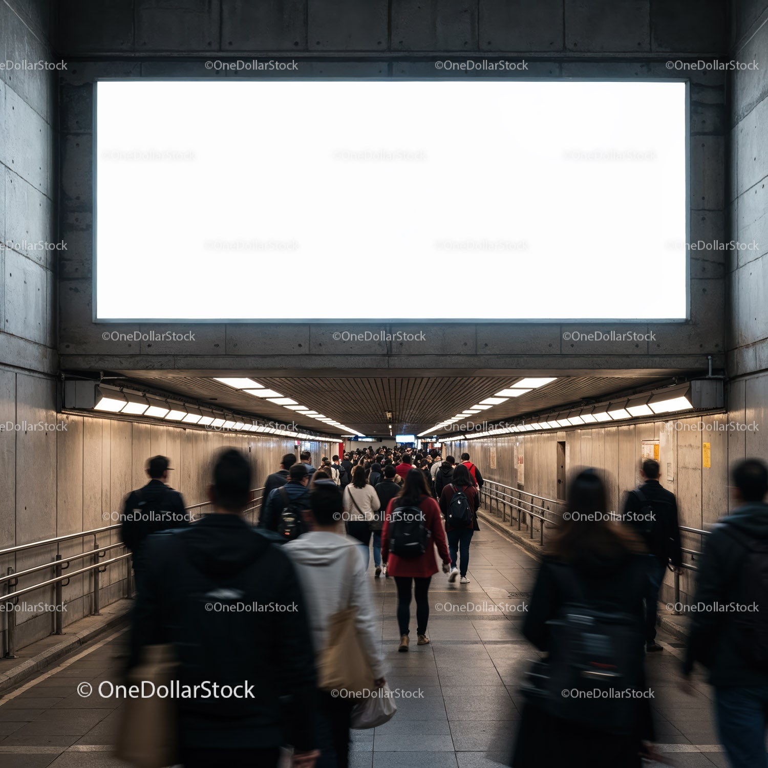 Crowded urban underground walkway with commuters