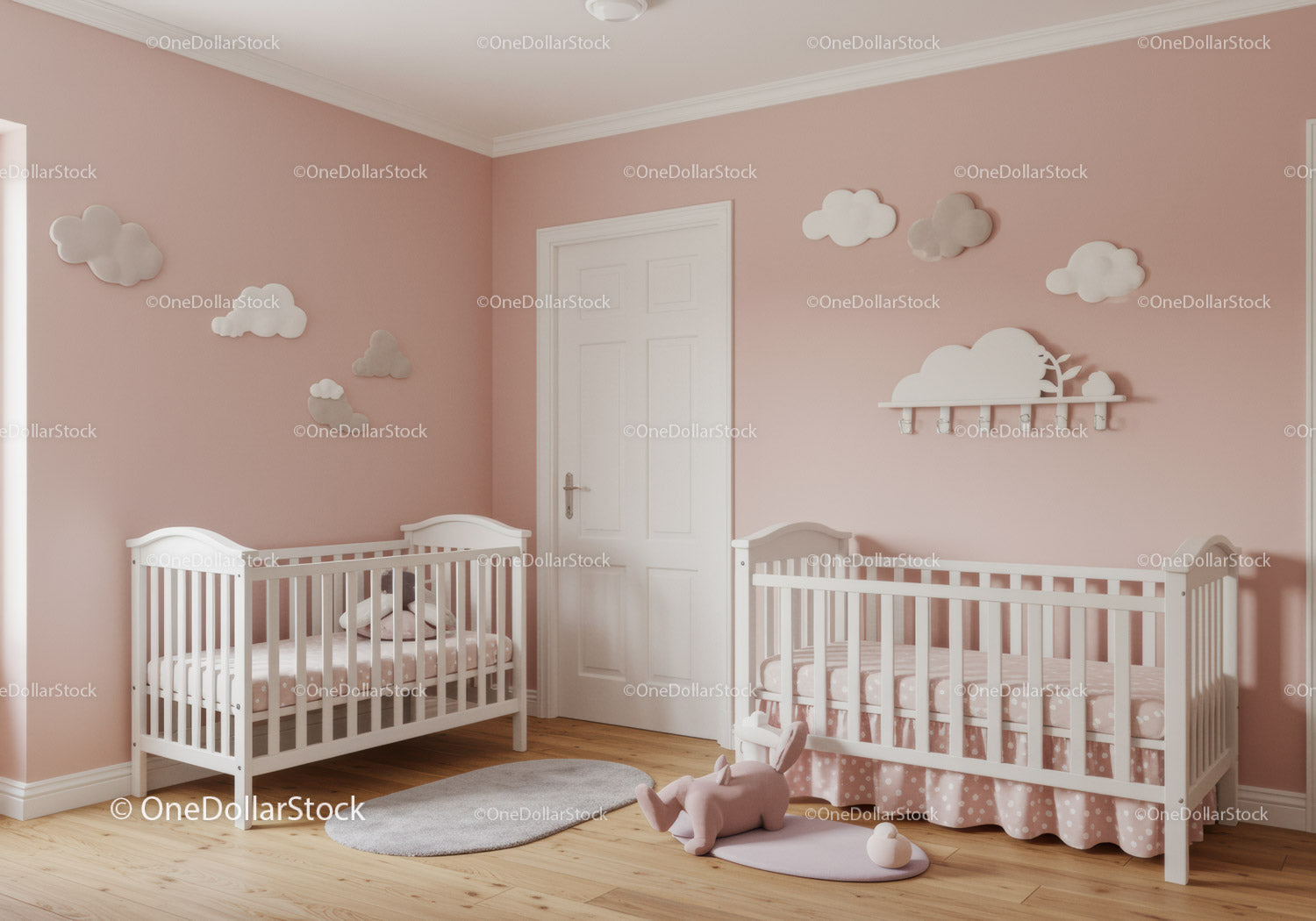 Cute Baby Nursery with Pink Walls and Cloud Wall Decor