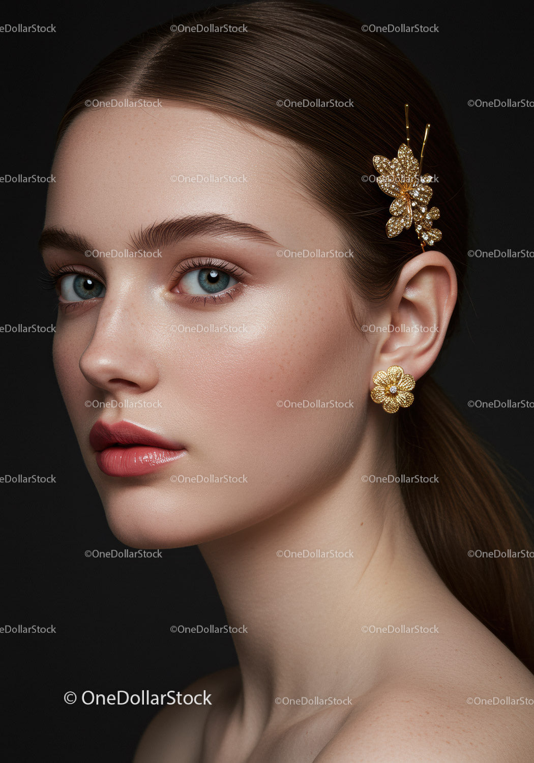 Elegant Woman Wearing Gold Jewelry with Floral Design and Hair Accessory
