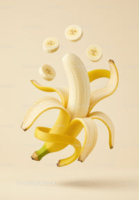 Peeled banana with floating banana slices on beige background