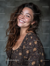Smiling Woman with Wavy Brown Hair and Floral Dress