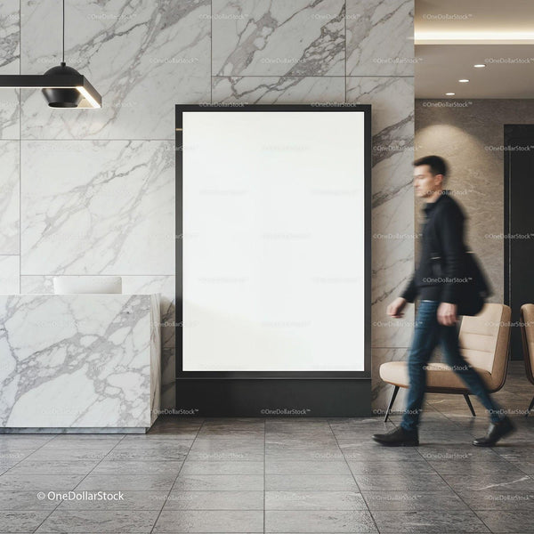Man walking past blank digital advertising display in lobby JPG Mockup Image