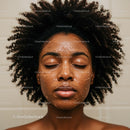 African American Woman with Curly Hair and Moisturizing Facial Mask