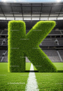 Green Grass Letter K on Soccer Field in Stadium