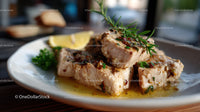 Fresh Fish Fillets Garnished with Herbs and Lemon Slice